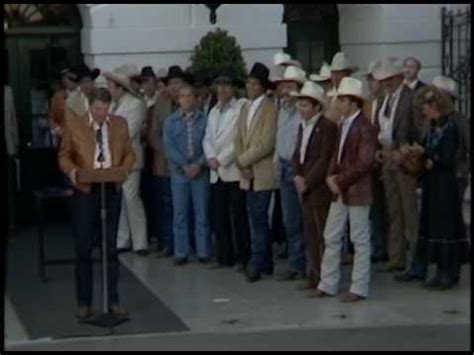 President Reagan’s Presents Belt Buckles to Winners of a.